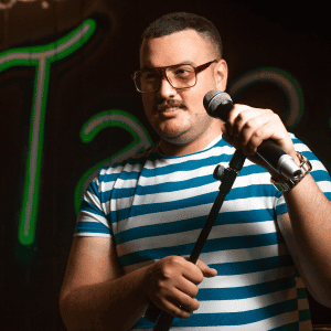 person performing with microphone in Durham NC