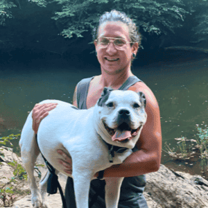 Bull City Pet Care Dog Walker with a dog 