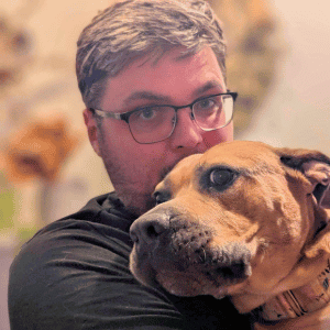 Bull City Pet Care Dog Walker with a dog 