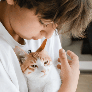 kid with cat in Durham, NC